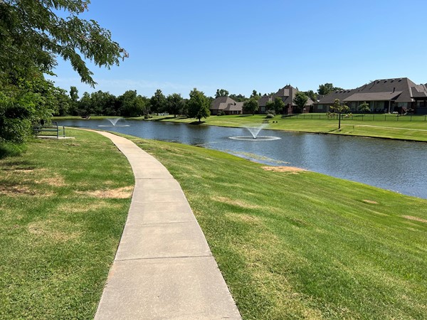 Living in Forest Glen, you will enjoy a small lake with a walking trail