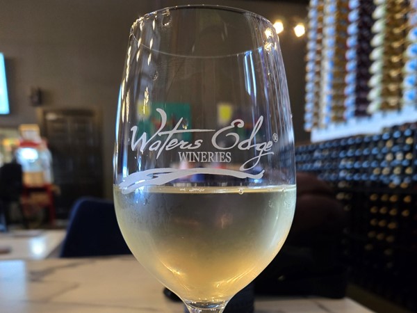 Unwind with a glass of elegance at Water's Edge Winery! Every sip tells a story! 