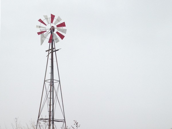 Beautiful windmill in the snow on a backroad near Ames