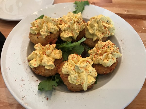 When 在育空, you must try the 'fried deviled eggs' at The Lokal restaurant 