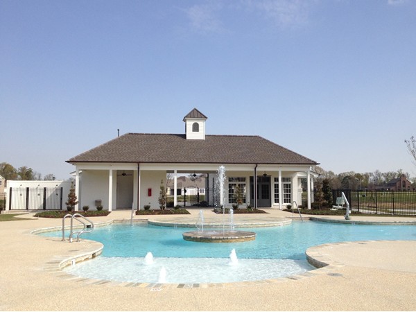 A pool view of the Long Farm Village Clubhouse