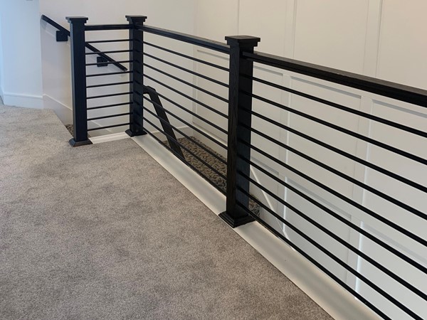 Horizontal handrail gives it a contemporary flair