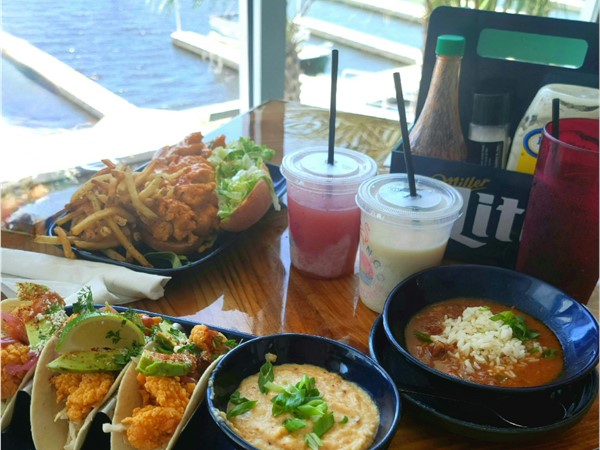 Enjoy delicious food at the Flamingo Landing restaurant with gorgeous water views. Dock & dine!