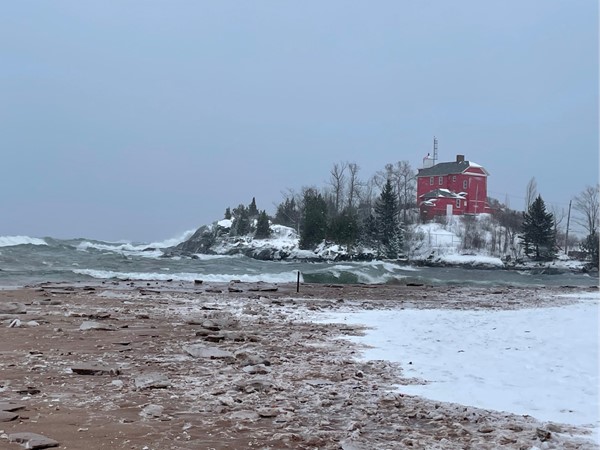 Marquette Harbor Lighthouse during a very blustery day in January 2022. Check out those waves