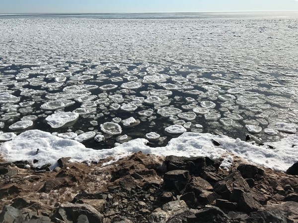 Pancake Ice along the shores of Lake Superior on a sunny spring day