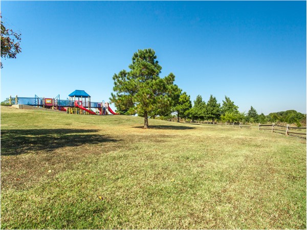 Edmond Park with playgrounds, disc golf course, skate park, amphitheater, and athletic complex 
