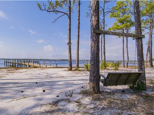 Relax on the swing and take in the Bay views in Bear Point Estates
