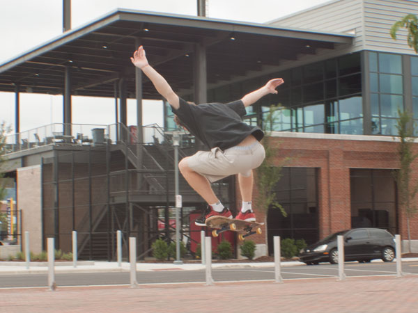 A skater makes a leap at Railroad Park
