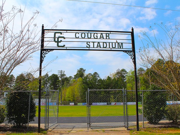 Those who enter Cougar Stadium at Cedar Creek School understand their motto of "Super Omnia"