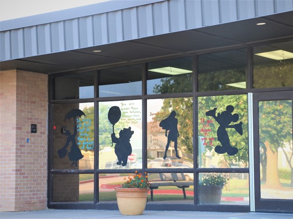 Loving this Disney theme they have painted on the front of the school! Let's inspire our kids 