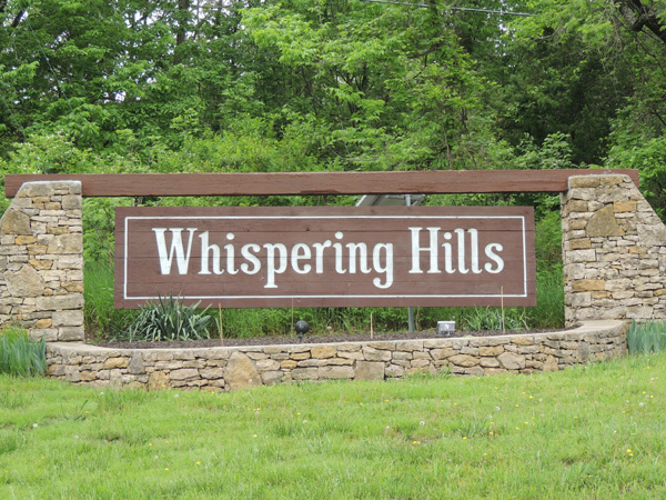 Entrance to Whispering Hills Subdivision in Lenexa, KS.