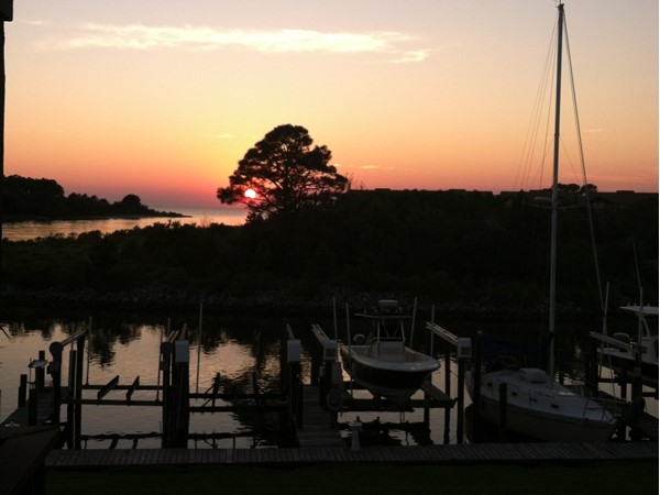 Endless summer sunset at Sailboat Bay in Gulf Shores, Alabama