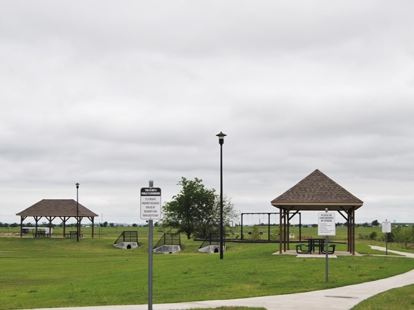 Carriage Park offers a walking trail, playground and a gathering place for the family cookout 