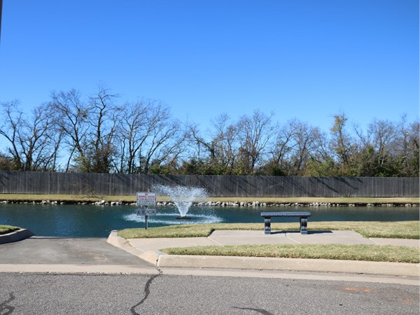 Pond with water feature located in back of the community. Sidewalks through out for walking 