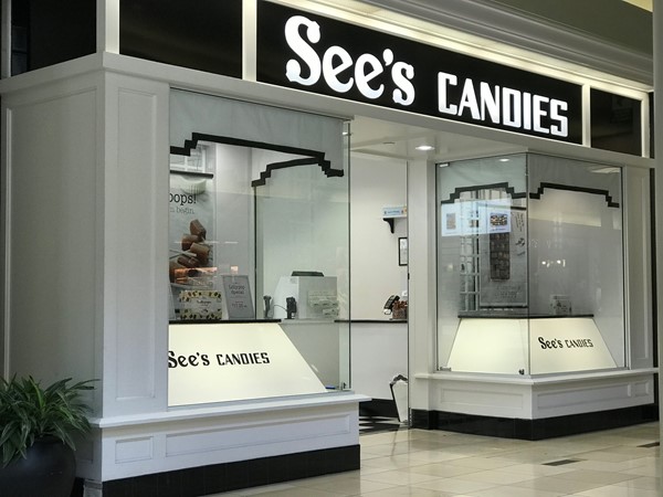 Stop by for a piece of free candy in Penn Square. See’s Candies