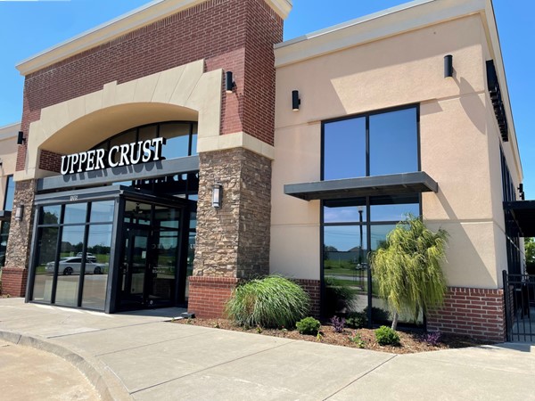Upper Crust offers wood-fired pizza, pasta, salads, wide wine selection and great weekly deals