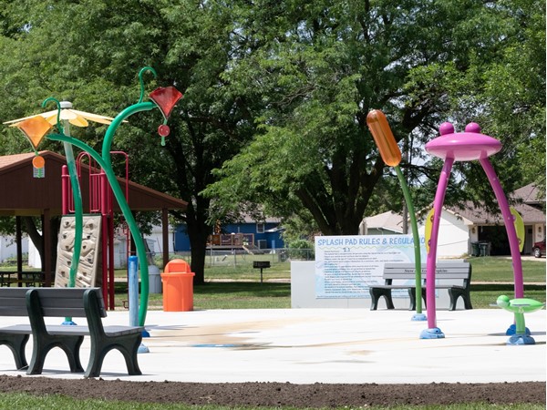 Cool off under the brightly colored water features in Sloan's City Park