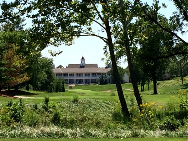 The clubhouse at The National provides a stunning backdrop for the, par five, eighteenth hole 