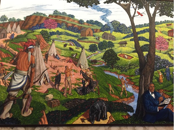 One of the murals hanging in the Clay County Courthouse on the 3rd floor, depicts the Iowa Tribe