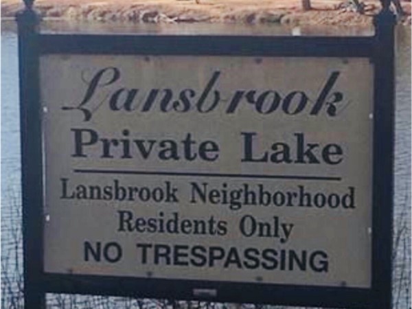 Lansbrook has a beautiful private lake with a fountain surrounded by trees and walking trails