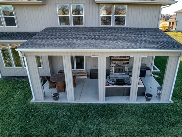 Enjoy the expanded patio of this Makenna complete with outdoor fireplace