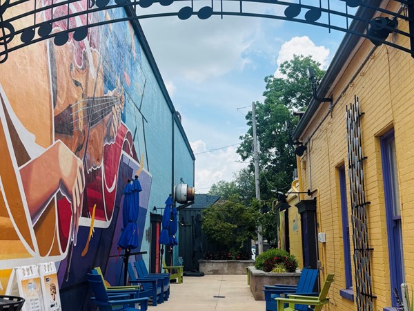 This fantastic painting in Merchants Alley emphasizes local history and a lovely seating area