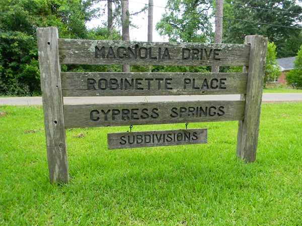 University Hills subdivisions include homes in Magnolia Drive, Robinette Place, & Cypress Springs.