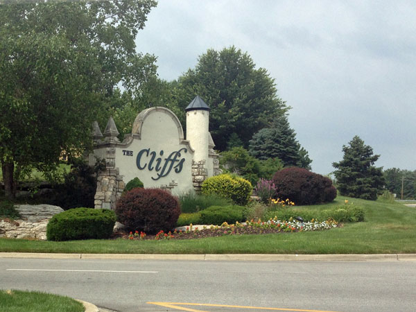 The Cliffs subdivision has rolling hills, spacious lots, and many large trees.