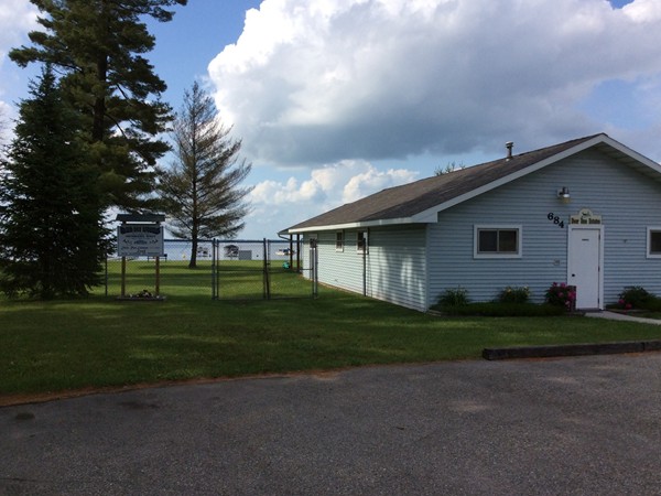 Clubhouse for Running Deer Estates with beach access and boat mooring on Houghton Lake