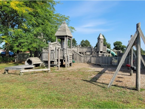County playground with disc golf, basketball courts, and open areas