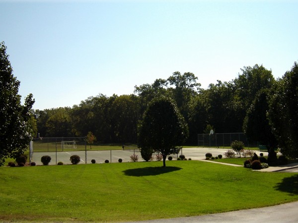 Tennis courts are just one of the amenities in the gated community of Stone Meadow