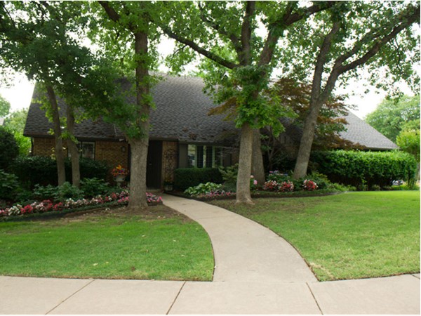 This is a typical home in Turtlecreek Cove in Edmond.  The lots are wooded with beautiful lawns