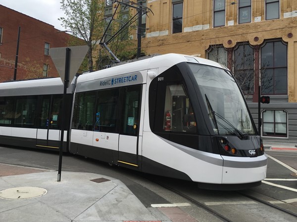 One of the new street cars traveling through the City Market in Kansas City
