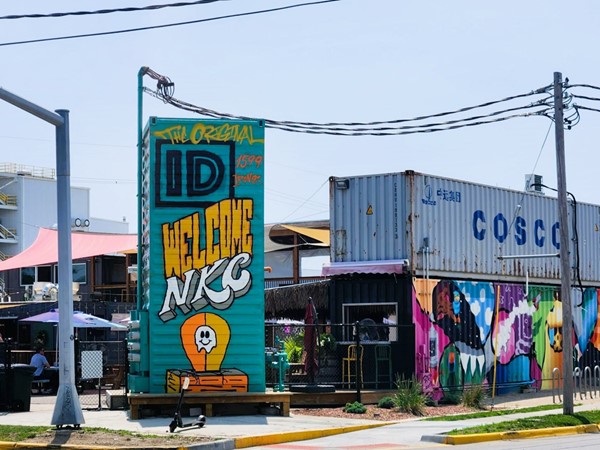 Discover the Iron District with unique eateries, bars, and shops housed in shipping containers