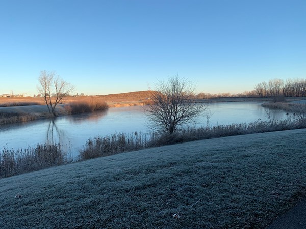 Prairie Lake is frosted over early in the morning 