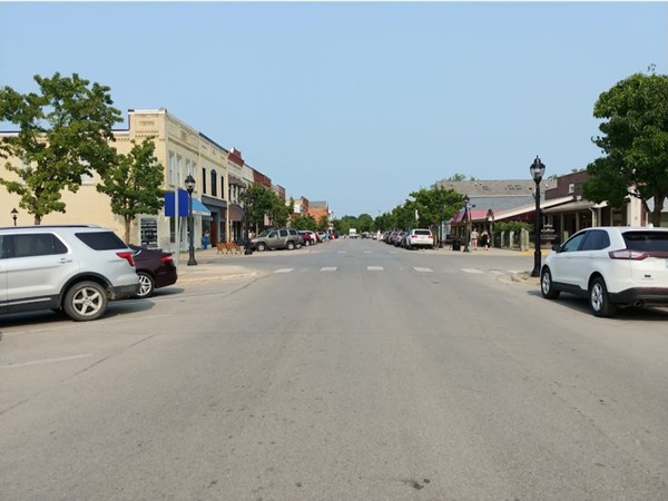 Elk Rapids shops are busy on this sunny, summer midweek afternoon