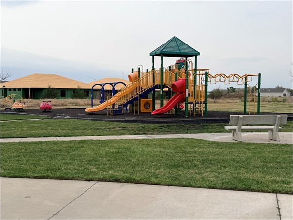 Playground in the neighborhood. Makes day to day life easier, especially for families with kids.