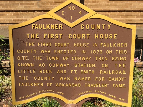 History marker indicating the site of the first Faulkner County Court House