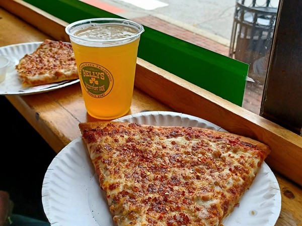 A pint and a slice at Kelly's Westport Inn, Kansas City's oldest building, with a window view 