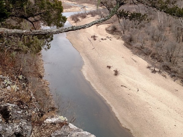 View of the Buffalo River from the River View Trail in Tyler Bend. Looks like a sandy beach