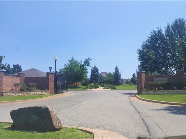 Gated entrance makes Crystal Gardens a private community located in South Oklahoma City 