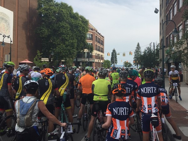 Downtown TC streets filled with cyclists at the start of the 2018 Cherry Roubaix Gran Fondo