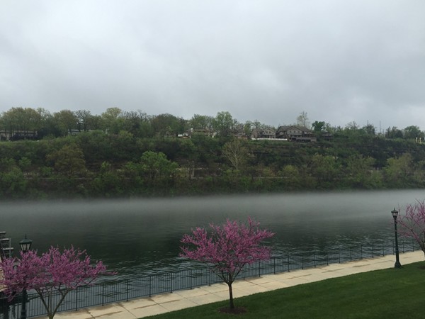 Lake Taneycomo fog in the evening. View from Branson Landing