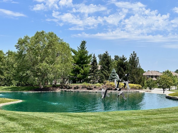 Art meets nature. Discover the sculptures along the pond at WatersEdge in Overland Park 