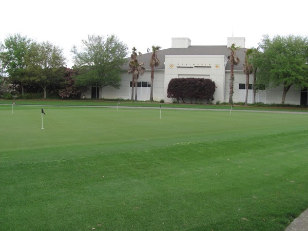Enjoy the practice putting green at The Peninsula Golf Course.