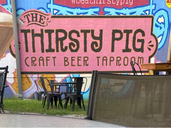 The Thirsty Pig has a great outdoor area, food, live music, and is kid and dog friendly