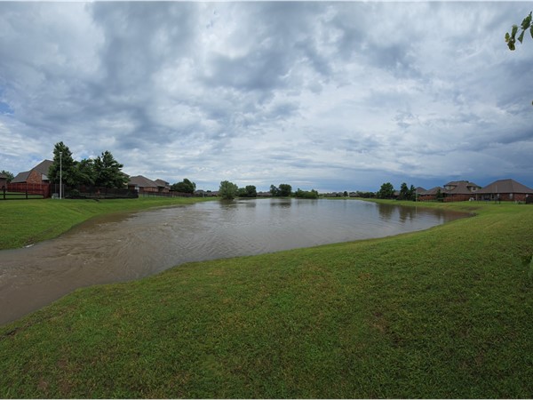 The pond in Falls At Garrett Creek is very full after recent rainfall