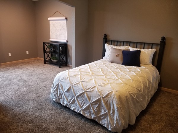 A lovely master bedroom at Shadow Glen Townhomes