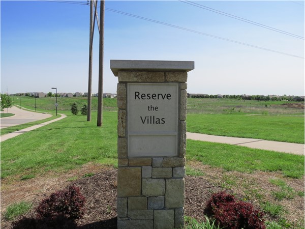 Sign for The Reserve Villas. Excellent patio homes