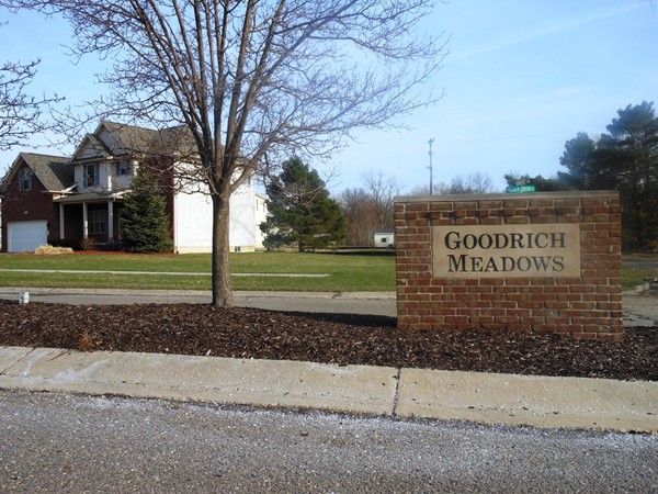 The welcoming front entrance sign to the Goodrich Meadows Neighborhood